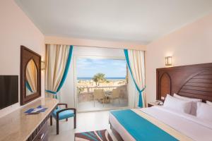 Utopia Beach Club客房内的一张或多张床位