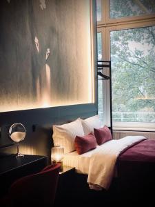 Ein Bett oder Betten in einem Zimmer der Unterkunft Sleephotels Casino