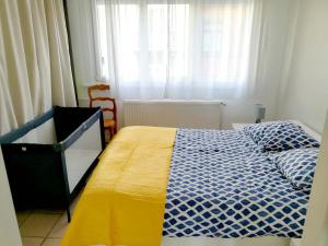 Posteľ alebo postele v izbe v ubytovaní Bienvenue chez vous ! Malo (3mn de la plage)