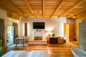 TV in/ali zabaviščno središče v nastanitvi Hotel Larice