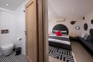 Ein Bett oder Betten in einem Zimmer der Unterkunft Villa Pırlanta, Kalkanvilla