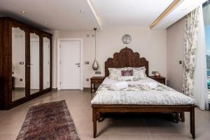 Ein Bett oder Betten in einem Zimmer der Unterkunft Villa Pırlanta, Kalkanvilla