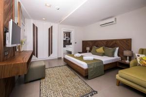 Ein Bett oder Betten in einem Zimmer der Unterkunft Villa Pırlanta, Kalkanvilla
