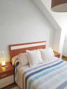 Postel nebo postele na pokoji v ubytování Vistas de lujo e inmejorable ubicación en Combarro