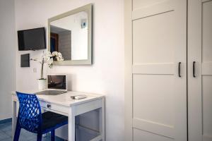 TV a/nebo společenská místnost v ubytování Sonnino B&B + 37 fotografií
