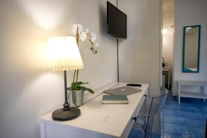 TV a/nebo společenská místnost v ubytování Sonnino B&B