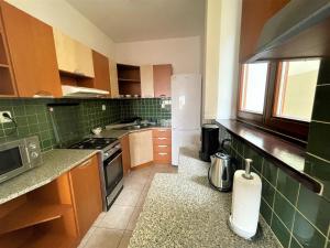 A kitchen or kitchenette at TATRANSKY DOM sk