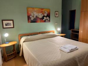 Postel nebo postele na pokoji v ubytování B&B San Michele a Porta Pia