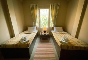 New Hotel Castle客房内的一张或多张床位