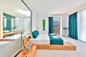 Postel nebo postele na pokoji v ubytování Villa Pax - Kalkan Villa