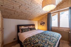 Postel nebo postele na pokoji v ubytování Alpine chic penthouse The best location in Verbier