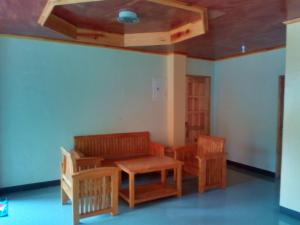 a room with a table and chairs and a ceiling at MOTHER MARRY INN in Sagada +56 photos