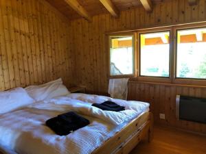 Postel nebo postele na pokoji v ubytování A l'orée du bisse