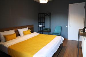 Rúm í herbergi á Paradise Inn Kazbegi