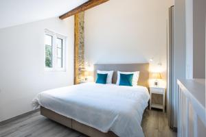 Cama o camas de una habitación en Auberge des Grands Bois