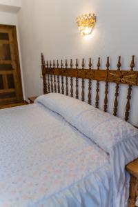 Cama o camas de una habitación en Hostal Santo Domingo de Silos