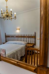 Cama o camas de una habitación en Hostal Santo Domingo de Silos