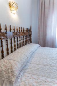 Cama o camas de una habitación en Hostal Santo Domingo de Silos