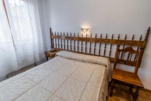 Cama o camas de una habitación en Hostal Santo Domingo de Silos
