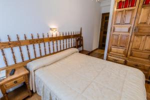 Cama o camas de una habitación en Hostal Santo Domingo de Silos