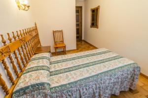 Cama o camas de una habitación en Hostal Santo Domingo de Silos