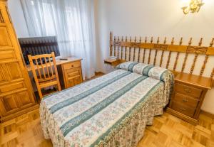 Cama o camas de una habitación en Hostal Santo Domingo de Silos