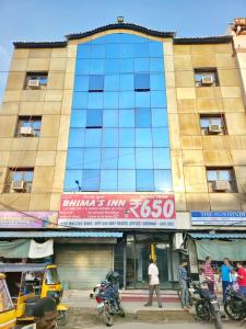 a building with a sign on the front of it at BHIMAS INN -Puratchi Thalaivar Dr M G Ramachandran Central Railway Station Chennai in Chennai