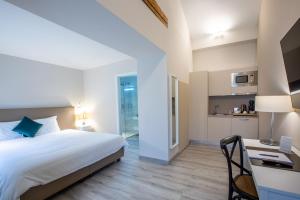 Cama o camas de una habitación en Auberge des Grands Bois