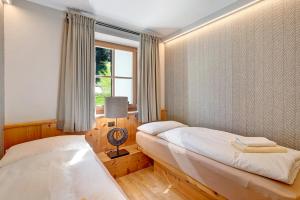 Posteľ alebo postele v izbe v ubytovaní Chalet Sonne Apt Grande