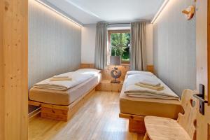 Posteľ alebo postele v izbe v ubytovaní Chalet Sonne Apt Grande