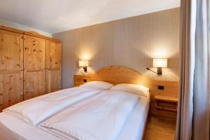 Posteľ alebo postele v izbe v ubytovaní Chalet Sonne Apt Grande