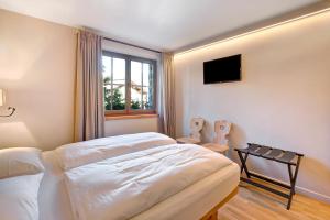 Posteľ alebo postele v izbe v ubytovaní Chalet Sonne Apt Grande