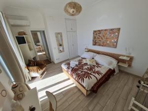 a bedroom with a large bed in a room at Suite Casalbivio in Positano