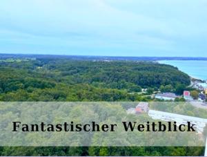 an aerial view of a field and the ocean at Top - Apartment mit Aussicht in Timmendorfer Strand
