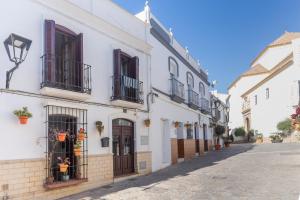 a street in a town with white buildings at Casa Blanca in Estepona
