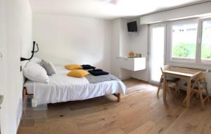 Postel nebo postele na pokoji v ubytování Plein coeur de Nendaz