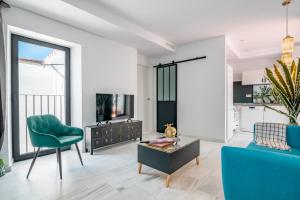 Telewizja i/lub zestaw kina domowego w obiekcie Dreams of Marbella Old Town