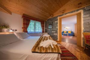 Postel nebo postele na pokoji v ubytování Lo Scoiattolo Hotel