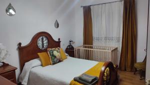 Postel nebo postele na pokoji v ubytování Casa" VISTAS AL TEIDE" mar Piscina privada parking cubierto gratuito en las instalaciones