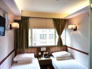 Postel nebo postele na pokoji v ubytování Celltronik Hostel 先創旅店 + 37 fotografií