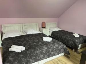Postel nebo postele na pokoji v ubytování Hotel New Star