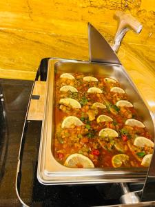 a tray of food with a pan of food at Esperanza Petra in Wadi Musa