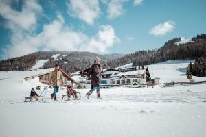 Hostia v ubytovaní Übergossene Alm Resort