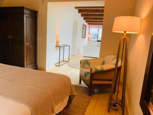 Posteľ alebo postele v izbe v ubytovaní Hotel Masia La Palma