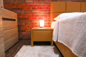 Posteľ alebo postele v izbe v ubytovaní «Go West» guest rooms