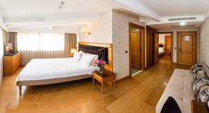 Postel nebo postele na pokoji v ubytování Aprilis Hotel - Special Category