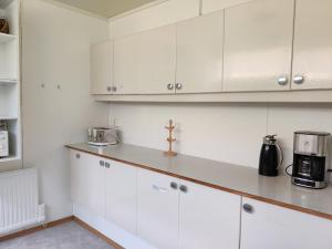 Kuchyň nebo kuchyňský kout v ubytování Sólbrekka Guesthouse