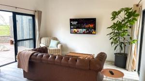 TV a/nebo společenská místnost v ubytování The Croft