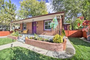 a house with a purple door and a fence at Enchanting Reno Retreat with Deck Walk to Midtown! in Reno