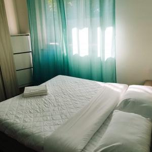 Giường trong phòng chung tại Appartamento Galvani